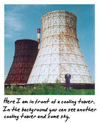 Here I am in front of a large cooling tower. In the background you can see another cooling tower and some sky.